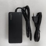 Black power supply with power cord.