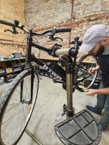 Bike repair in a workshop.